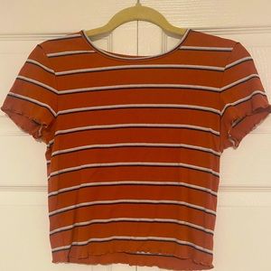 American Eagle burned orange striped and rubbed top. Size medium.